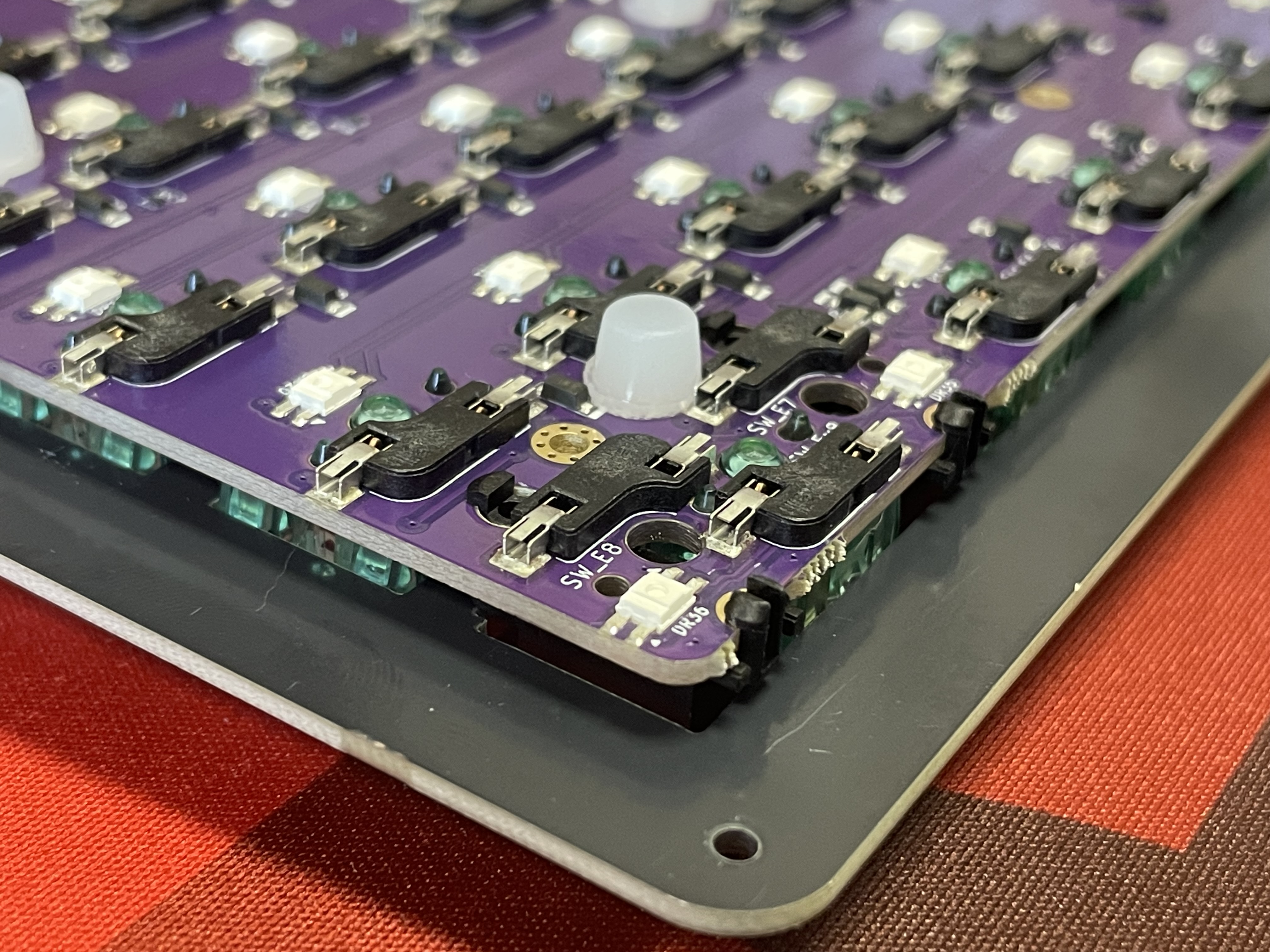 PCB placed into plate assembly with FLAHNS bumpers